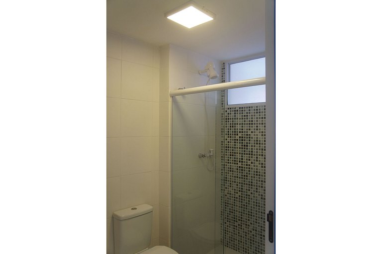 B 102 Apartamento térreo com jardim na região de Guarajuba