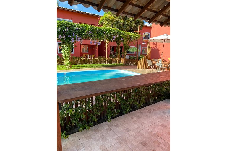 B 102 Apartamento térreo com jardim na região de Guarajuba