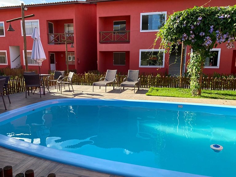 B 102 Apartamento térreo com jardim na região de Guarajuba