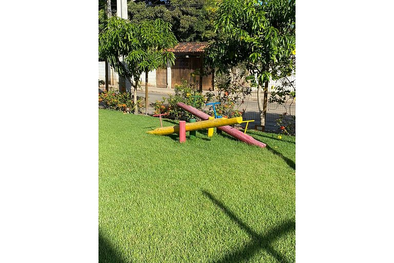 A-101 - Apartamento térreo com jardim na região de Guarajuba