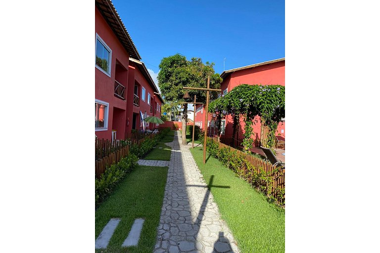 B 102 Apartamento térreo com jardim na região de Guarajuba